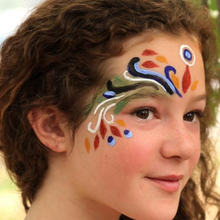 Girl with colorful facepaint on